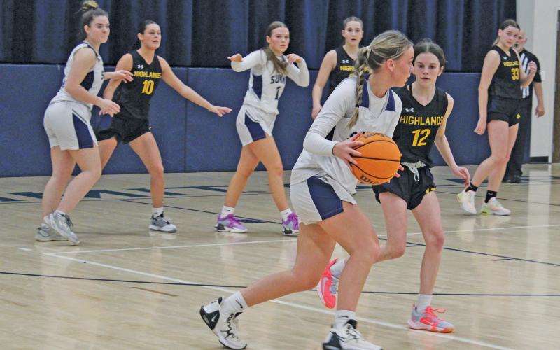 Photo by Michael O’Hearn/Staff - Highlands stifled Summit during their girls basketball game with a stingy pressure defense that forced several turnovers and led to easy baskets in transition.