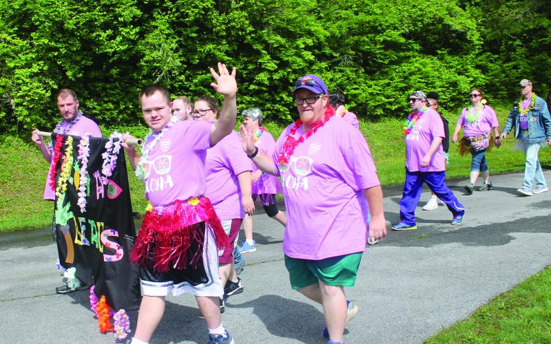 Special Olympics athletes complete the ceremonial walk which kicked off the games at Highlands School.