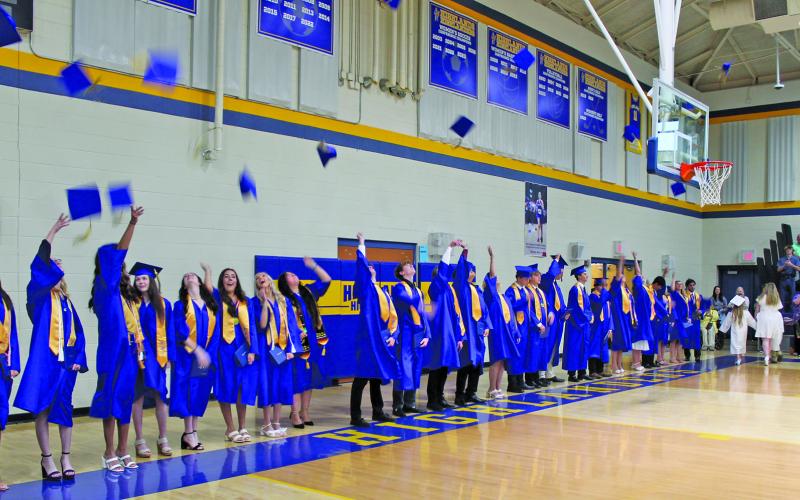 Highlands graduating class of 2024 tosses their caps at the end of Saturday’s commencement ceremony.