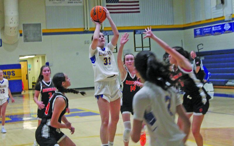 Lady Highlanders junior Hunter Conner makes a shot against Rosman.