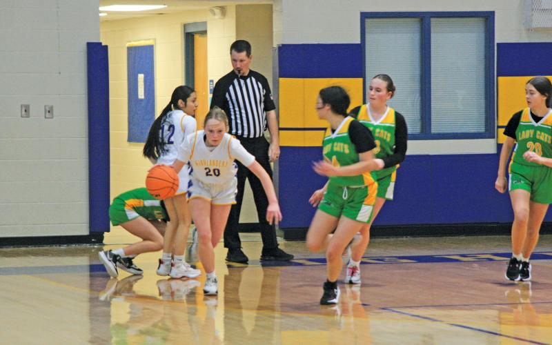 The Highlands girls team was able to pull away for a victory behind a strong rebounding effort.
