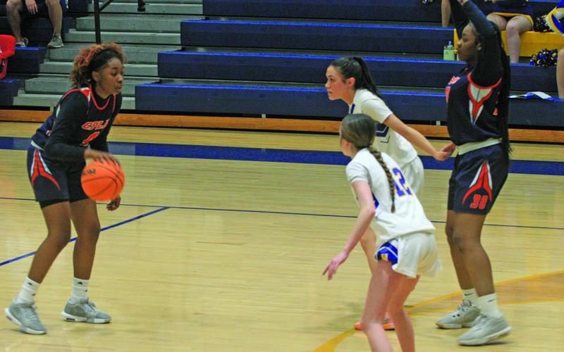 Highlands Jordyn Borino (12) and Aislynn Wyatt-Luck (2) defend the lane against CPLA’s Melody Johnson (4) and Shanya McRae (30).