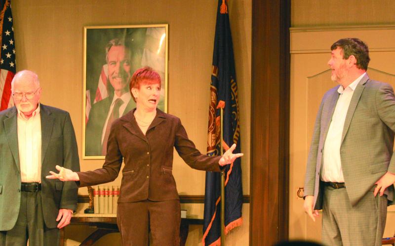 The Highlands Cashiers Players opened their production of “The Outsider” on March 20. The show will continue this coming weekend at The Martin Lipscomb Theatre inside the Highlands Performing Arts Center. Pictured are actors Ron Leslie, Diandra Mundy, and Craig Eister.