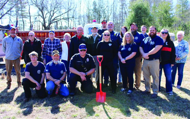 Otto Volunteer Fire and Rescue members, past and present, celebrate the start of construction of a new firehouse at 8249 Georgia Road, on Monday, Feb. 24.