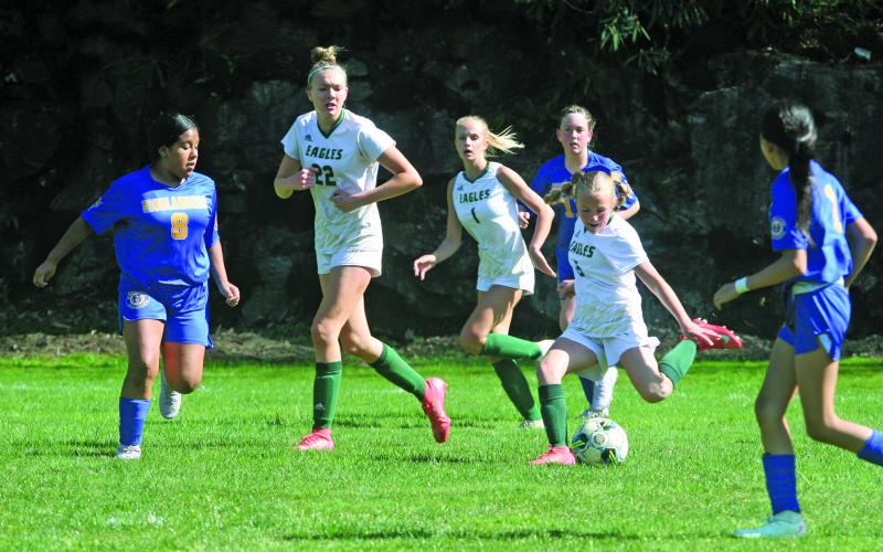Highlands’ Miley Zagal-Damien (8) tries to cut off Rabun Gap’s Alice Haney (5) as she looks to get a shot off during their game on Tuesday.