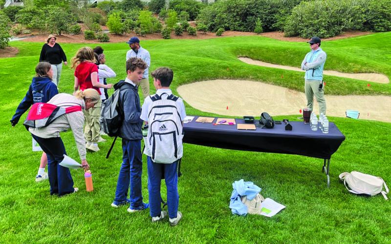 Sixth grade students from Summit Charter School were led through a series of science, technology, engineering and math lessons while on a field trip to Wade Hampton Golf Club this week.