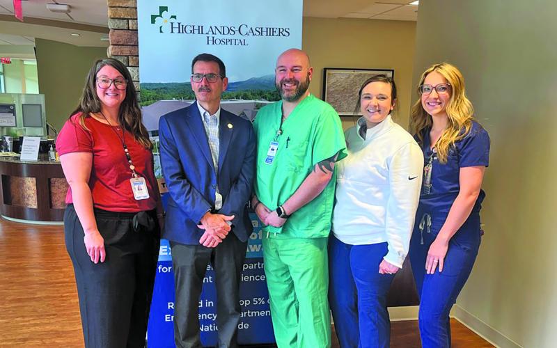 Nurses Morgan Martin, Kyleigh Watson, Jessica Galloway, and director of hospital operations Hollis Whitehead snap a photo with hospital CEO Tom Neal to kick off National Nurses Week festivities at Highlands-Cashiers Hospital. National Nurses Week runs May 6-12.