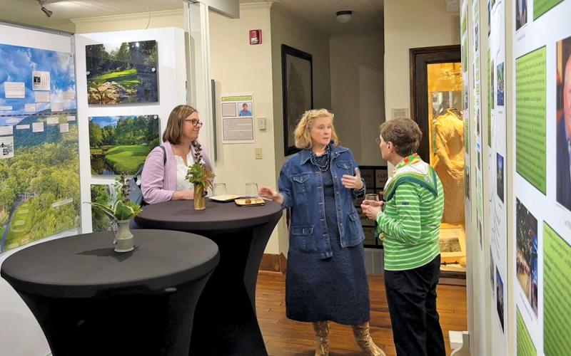 Author Elizabeth Engelhardt discusses her book “Boardinghouse Women” with attendees.
