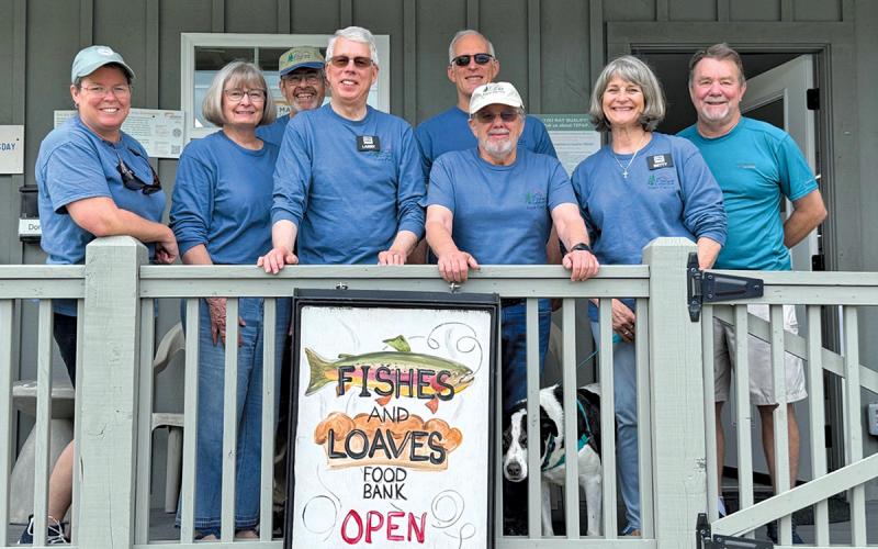 Peter Hall, Stanley Odum, Bonnie Grossman, Lynne Griffon, Larry Morris, Phillip Jackson, Betty Morris and Bill Fehrs help carry the mission of Fishes and Loaves.