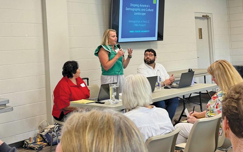 Faviola Olvera, Leonal Gonzales and Leslie Manning lead a discussion on the complexities of immigration.