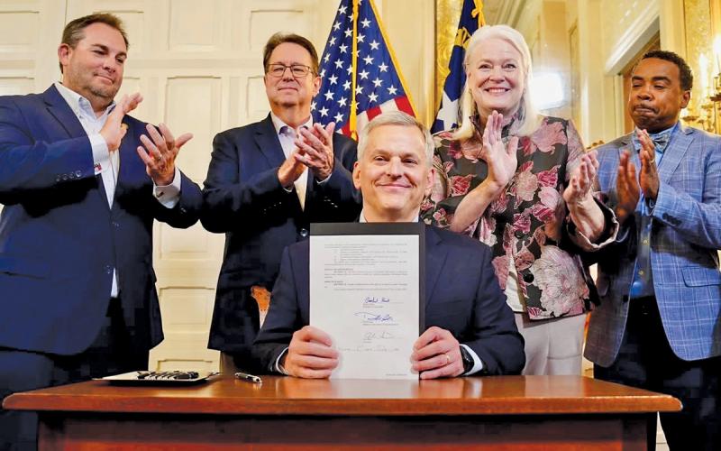 Sen. Kevin Corbin sponsored Senate Bill 124 and joined Gov. Josh Stein as he signed the bill into law.
