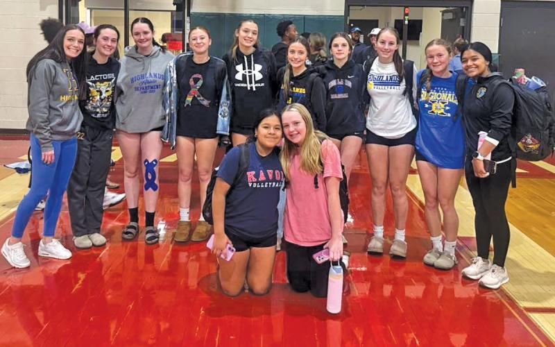 Highlands Volleyball Postgame Team gather for an end of season photo.