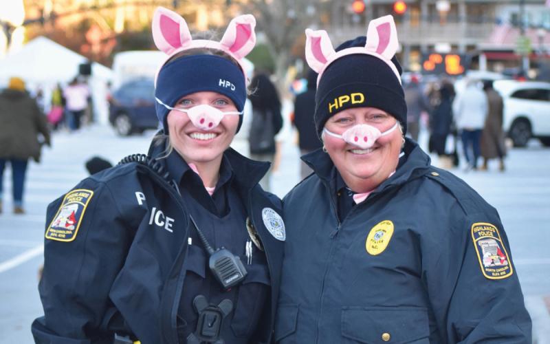 Officer Ashley Moore and Chief Andrea Holland join the Halloween festivities as part of the department’s community outreach.  |  Highlands Chamber of Commerce