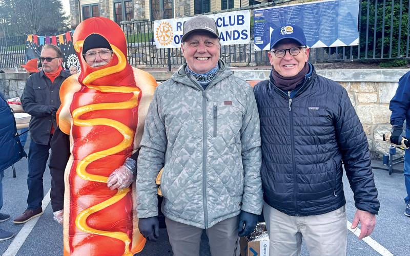 Rotarians Ron Leslie, Jimmy Bewley, and Scott Carter prepared hot dogs.  |  Josh Bryson/Staff