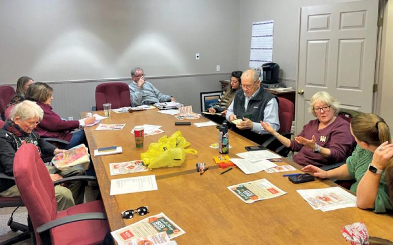Members of a quarter-cent sales tax planning team meet to discuss strategy for promoting the 2026 ballot initiative to residents.