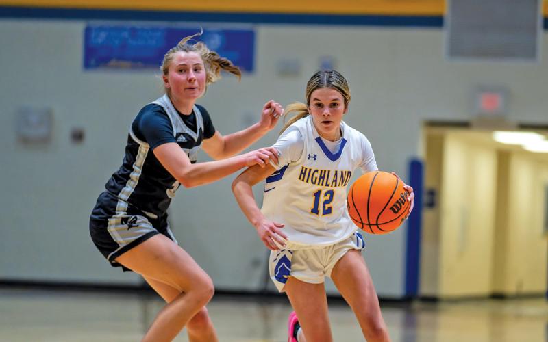 Junior Jordyn Borino darts past a Robbinsville defender in the Lady Highlanders 45-41 overtime loss.  |  Photo by Todd Sumner