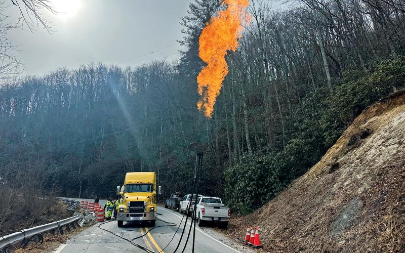 Crews removed the propane from the wrecked truck by burning off its vapor.