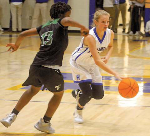 Highlander sophomore Hayley Borino drives the ball up court against visiting Tallulah Falls in Highlands’ 64-49 season opening win on Tuesday. Borino’s 18 points led all scorers.