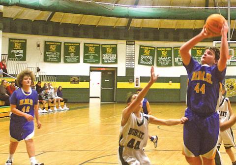 Highlands’ Sam Stiwinter (44) goes up for a basket during the first half against Blue Ridge on Thursday, Nov. 21.