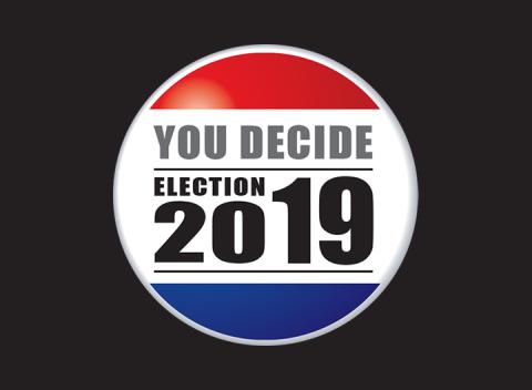 Commissioner race too close to call