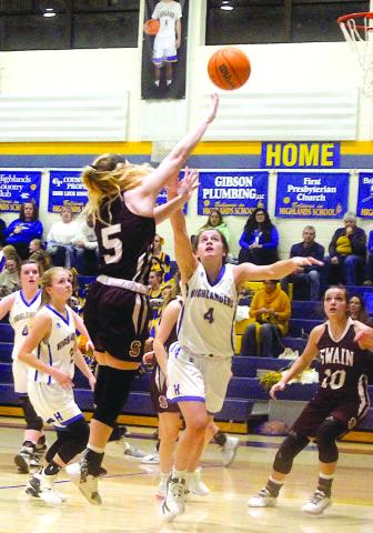 Julia May Schmitt (4) cuts to block off Ashton Yonce (5) of Swain County.