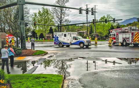 The ambulance carrying fallen Glenville-Cashiers Rescue Squad member Eldon Jamison rolled slowly through the Cashiers crossroads on its way to the Glenville station.