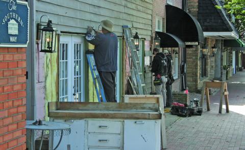 Work was underway at several businesses in Highlands on Wednesday morning. Retail shops will be allowed to reopen as of 5 p.m. on May 8.