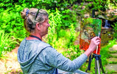 Madeline Dukes, a featured artist from Charleston, South Carolina, took advantage of perfect weather and beautiful scenery during the Cashiers Plein Air Festival held on July 15-19 at The Village Green.