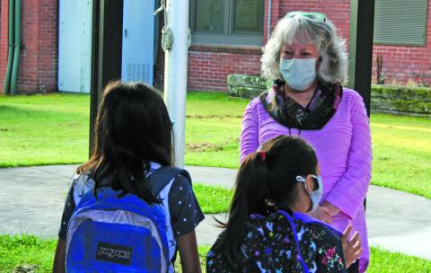 Highlands School administrators and staff members greeted elementary school students outside on Monday for the first day of in-person classes during the 2020-21 school year. 