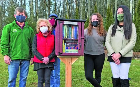 Pictured with the most recent Little Free Library installation are Andy Chmar, Hudson Library of Highlands board president, Helene Siegel, Hudson Library trustee, Ricky Siegel, Little Free Library steward,  Jenni Edwards, marketing manager for The Literacy and Learning Center and Bonnie Potts, executive director of The Literacy and Learning Center.