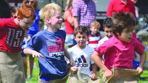 A group of kids playing field games during Fourth of July two years ago. 
