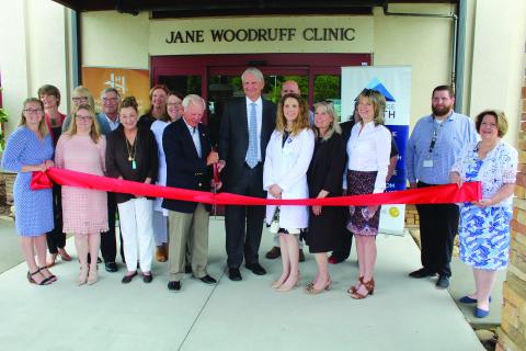 Photo by Michael Ohearn/Crossroads Chronicle    Dr. Walter Clark, Dr. Richard Hudspeth, BRH Staff, HCHF Board and staff cut the ribbon to the Blue Ridge Health Clinic. 