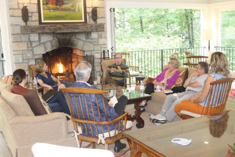 Photo by Christopher Smith/Staff Author John T. Edge and his wife, artist Blair Hobbs talked with Half-Mile Farm visitors on Saturday, Sept. 11. 