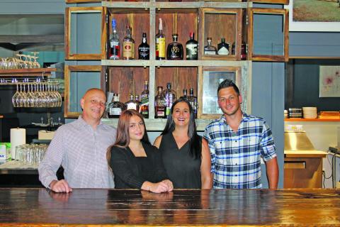 Photo by Christopher Smith/Staff David, Magnolia and Jennifer Cunningham with Zack Hedden. 