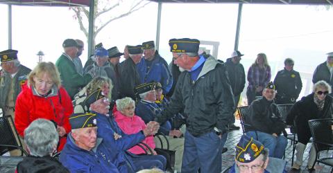 Photo by Christopher Smith/Staff Mayor Patrick Taylor shakes the hand of a veteran. 