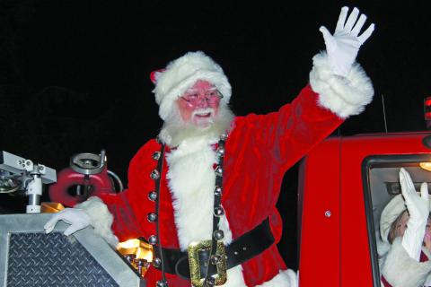 Santa Claus made his appearance on the back of a firetruck at Kelsey Hutchinson Founders Park on Saturday. 