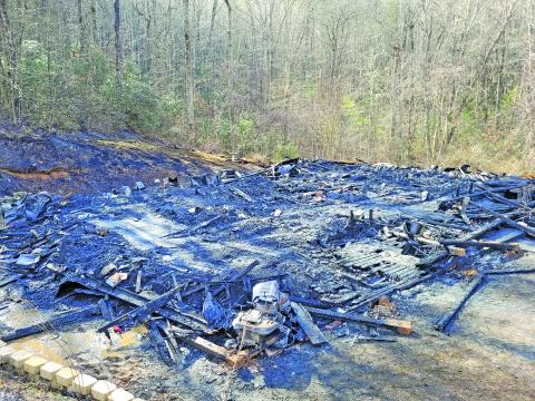 Photo by Megan Broome/The Clayton Tribune A morning structure fire at 736 Western Way in Rabun Gap on Jan. 13 resulted in two fatalities. The wood-frame house was destroyed.