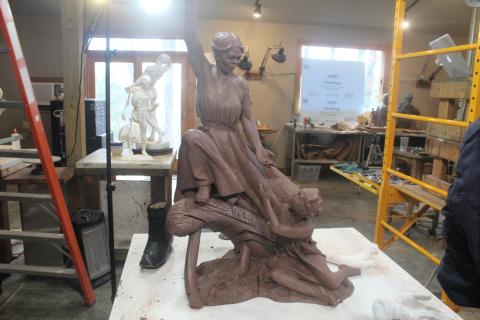 Wesley Wofford is the sculptor who created a 2,400-pound and nine-feet-tall statue portraying Harriet Tubman fighting against the wind to lead a slave girl on the Underground Railroad to freedom.