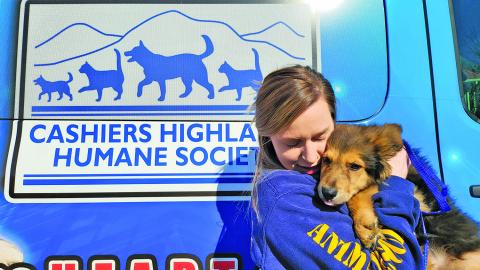 Submitted Photo CHHS Assistant Manager Jodi Henkel with one of the rescued puppies. 
