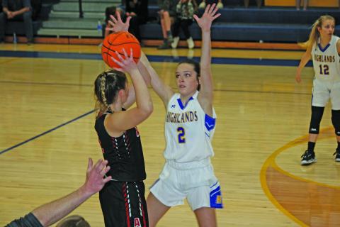 Photo by Ryan Hanchett/Staff Reese Schmitt guards an Avery County player. 