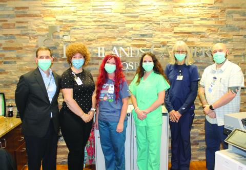 Photo by Christopher Lugo/Staff HCH CEO Tom Neal, Eckerd Living Center Director Emily Bowers, Kelli Randall, Jessica Brooks, Susan Kaminsky, and HCH Nursing Director Hollis Whitehead. 
