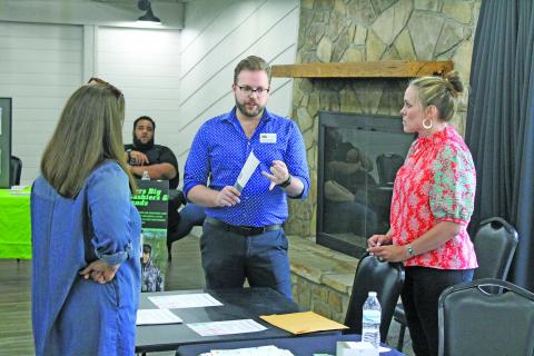 Photo by Christopher Lugo/Staff Mountain Theatre Company director Scott Daniels speaks with Marci Sherwood from the Highlands Chamber of Commerce during the first ever Highlands Volunteer Fair.
