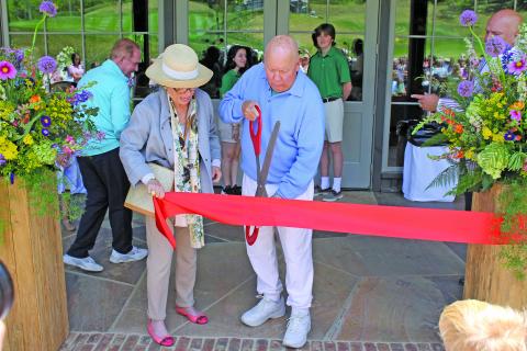Photo by Christopher Lugo/Staff Owner of Old Edwards Inn Resort and Spa, Art Williams and his wife, Angela cut the ribbon to GlenCove. 