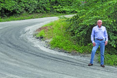Photo by Michael O'Hearn/Crossroads Chronicle Ed Belcak raised the concerns about the dangerous road conditions.