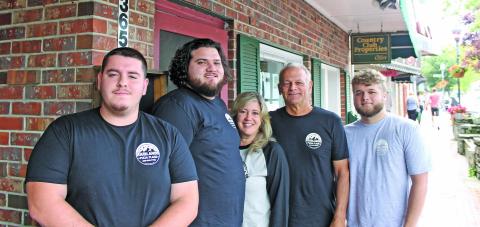 Photo by Christopher Lugo/Staff Dane, Garrett, Tommy, Dan and Pam Canary plan to open the new Highlands Pizza Place in the coming weeks. 