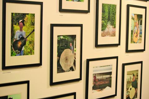 A wall of photos featuring musicians and their hand-crafted instruments is part of the “Tapping into Tone” exhibition at The Bascom Center for Visual Arts in Highlands. The exhibition will be on display through Dec. 23.