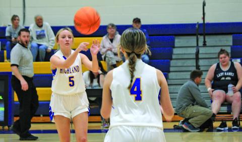 Highlands’ AE Woods (5) makes a pass to teammate Lillian Rutter (4) during a game against Nantahala. Highlands will face Hiwassee Dam in the Little Smoky Mountain 1-A Conference tournament championship on Thursday at Nantahala School.