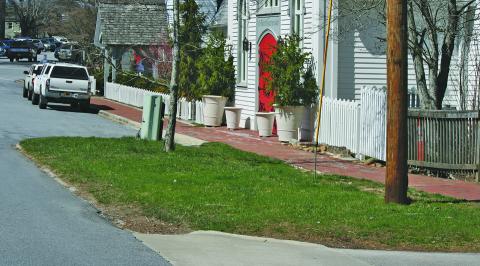 A plan to move two parking spaces led to a split vote by the Highlands Town Board.