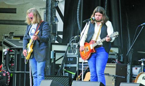 Photo by Ryan Hanchett/Staff Myron Elkins (right) and his band kicked off Saturday’s lineup at the Bear Shadow music festival at Winfield Farm.