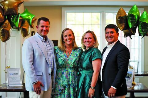 Frank and Bethany Weisser, left, and Sarah and Jonathon Barge at the Green and Gold Gala at Rabun Gap-Nacoochee School. Bethany and Sarah served as co-chairs on the gala’s volunteer committee.